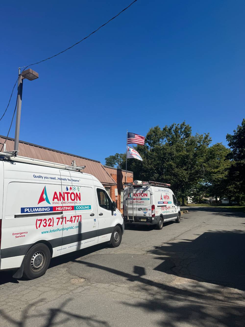 Anton Plumbing, Heating & Cooling service vans.