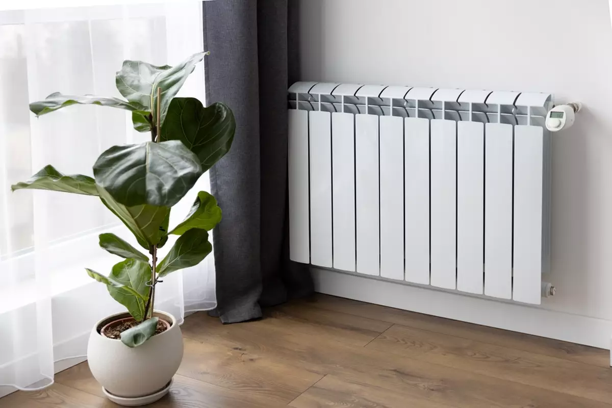 A radiator with a digital thermostat.